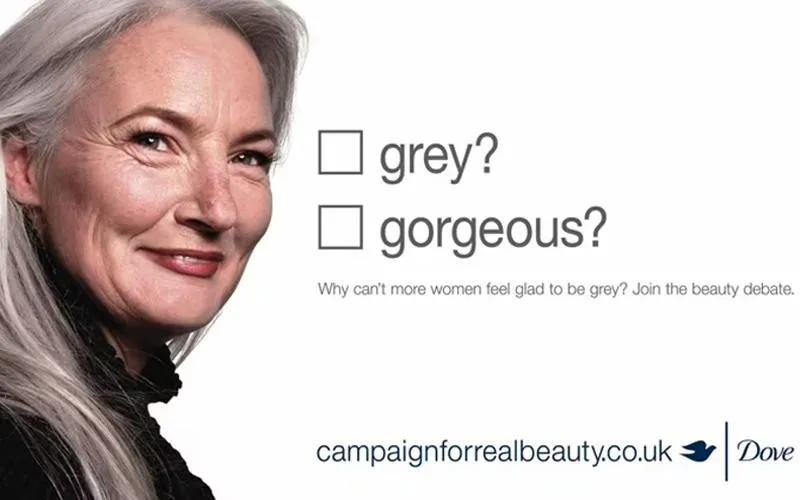 تصویر کمپین داو با خانم میانسال و دو گزینه "Gray?" و "Gorgeous?"؛ نمونه‌ای از ترکیب تبلیغات ATL و BTL در استراتژی TTL